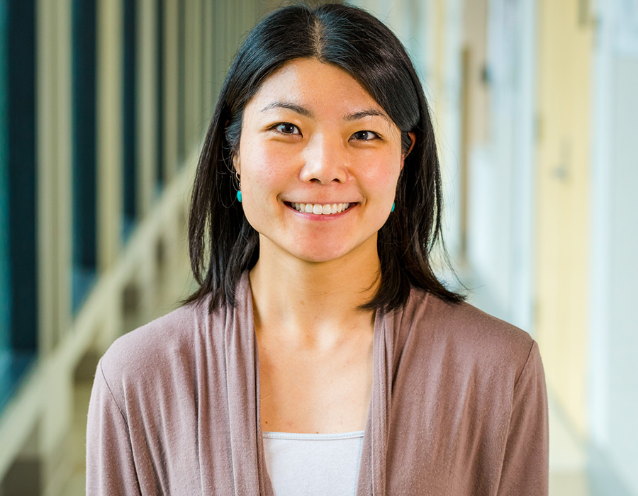 Postdoc Sayaka Masuko stands in the hallway of the Chemistry Building.