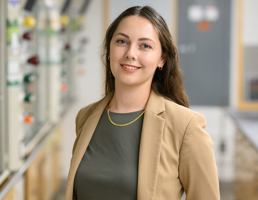 Professor Masha Elkin smiles in her lab.